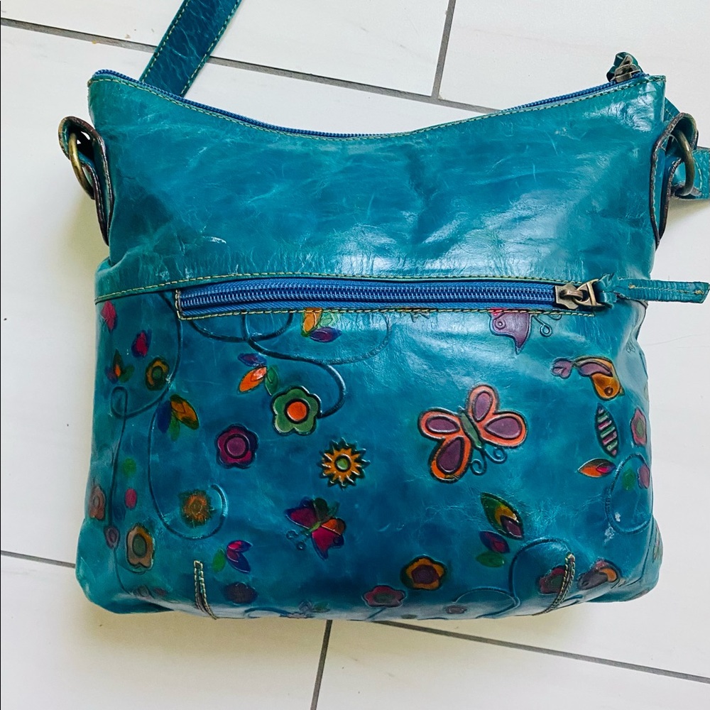 Genuine Leather crossbody handbag .